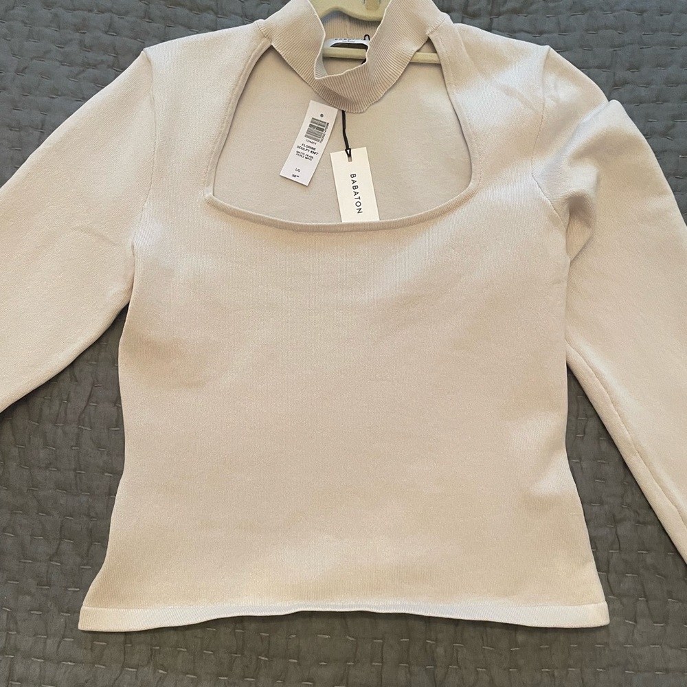 Aritzia cream body on top  -SOLD OUT IN STORES